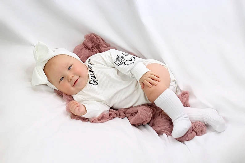 Guinevere is registered to the contest to win money with this photo: baby, baby_sleeping, baby_toddler_clothing, child, comfort, face, flash_photography, font, happy, headwear, joy, linens, love, pattern, person, photo_shoot, portrait_photography, sitting, smile, toddler