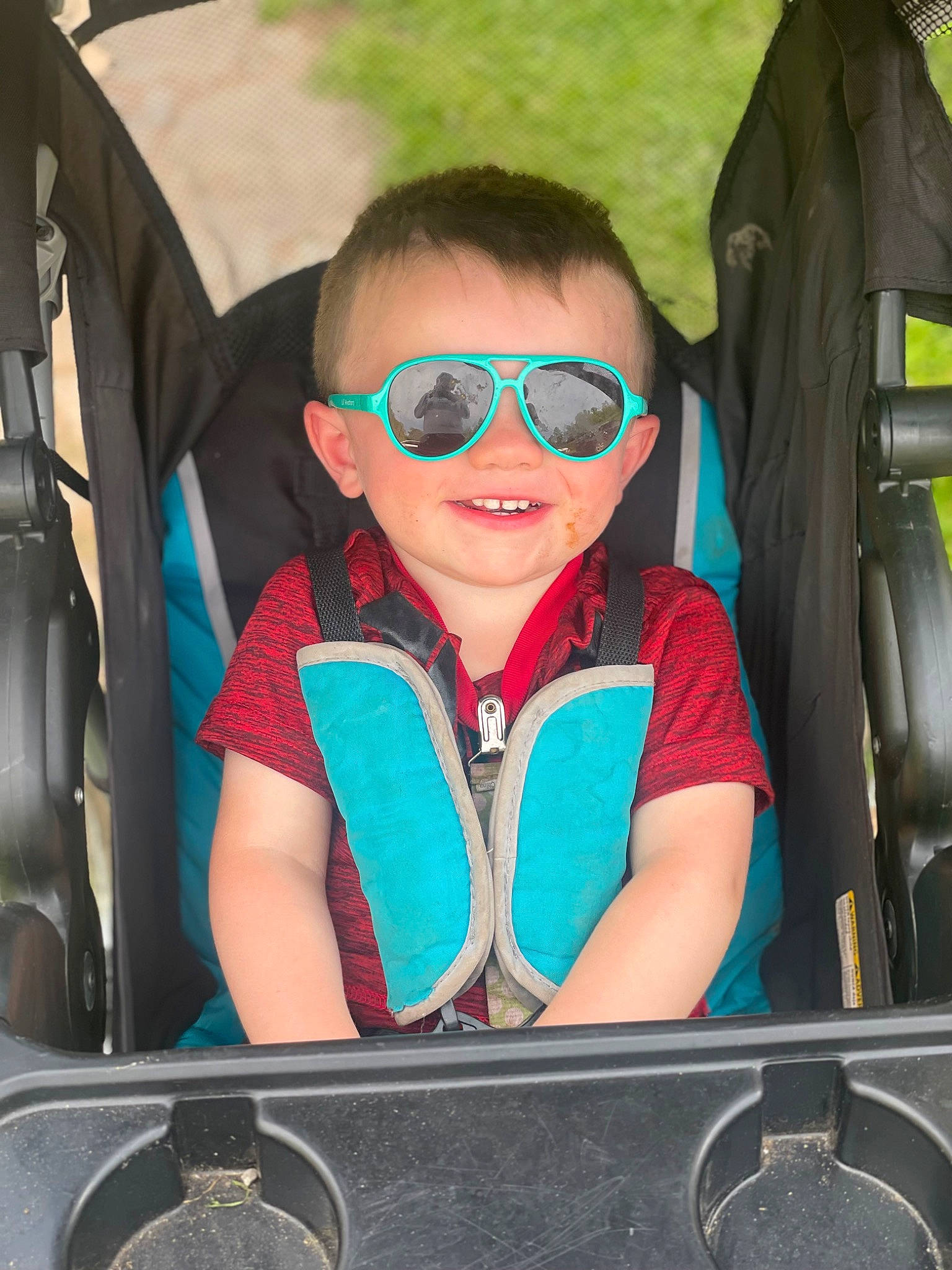 Brantley is registered to the contest to win money with this photo: auto_part, automotive_design, automotive_exterior, car_seat, electric_blue, eyewear, fun, glasses, goggles, joy, leisure, mode_of_transport, motor_vehicle, person, personal_protective_equipment, recreation, smile, steering_wheel, sunglasses, travel