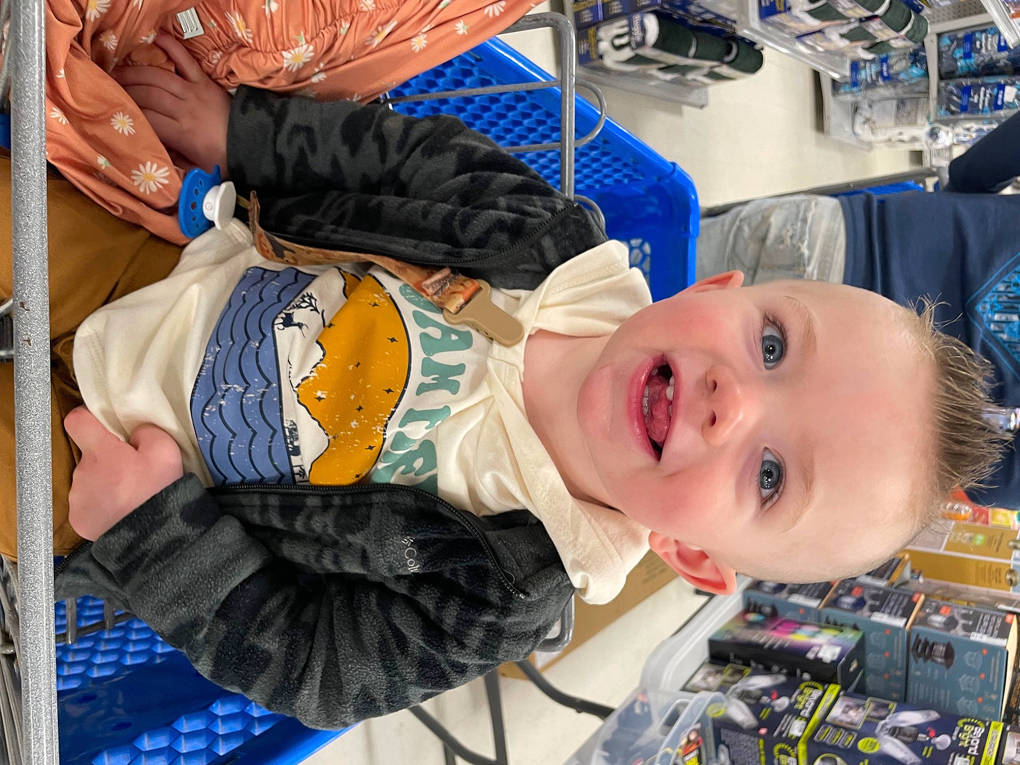 Brantley joined the competition — help win amazing prizes! baby, baby_products, baby_toddler_clothing, blue, cheek, child, fun, happy, joy, mouth, pattern, people, person, room, smile, tartan, textile, toddler, toy, vertebrate