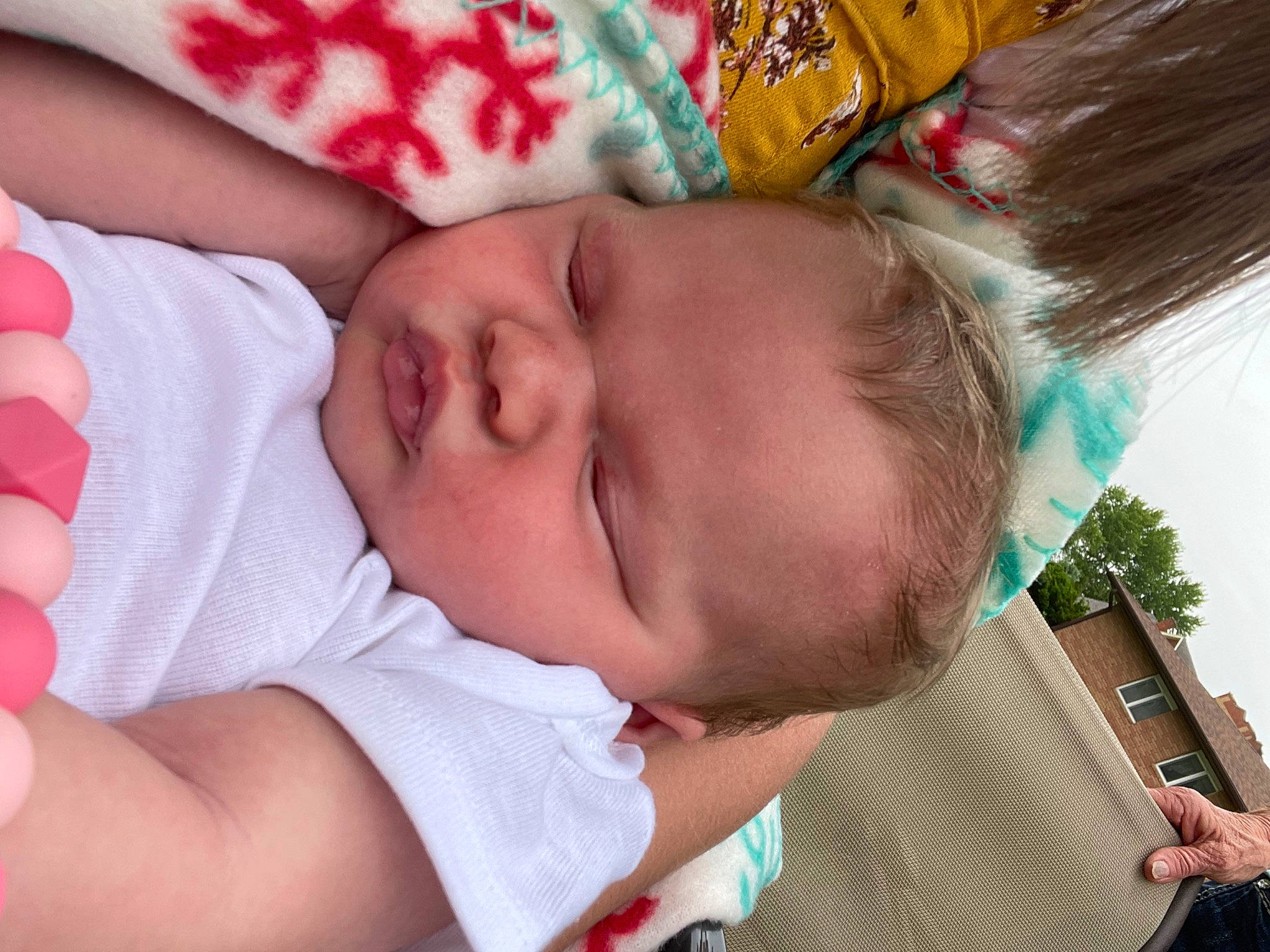 Lennon is registered to the contest to win money with this photo: baby, baby_toddler_clothing, cheek, child, chin, comfort, finger, green, hand, happy, iris, lip, mouth, nail, nose, organ, pattern, person, product, skin