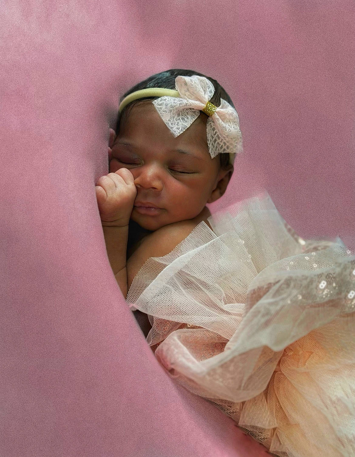 Alaysia is registered to the contest to win money with this photo: arm, baby, baby_toddler_clothing, cap, cheek, child, comfort, event, eye, eyebrow, face, hair_accessory, happy, headgear, headwear, human_body, iris, linens, person, skin