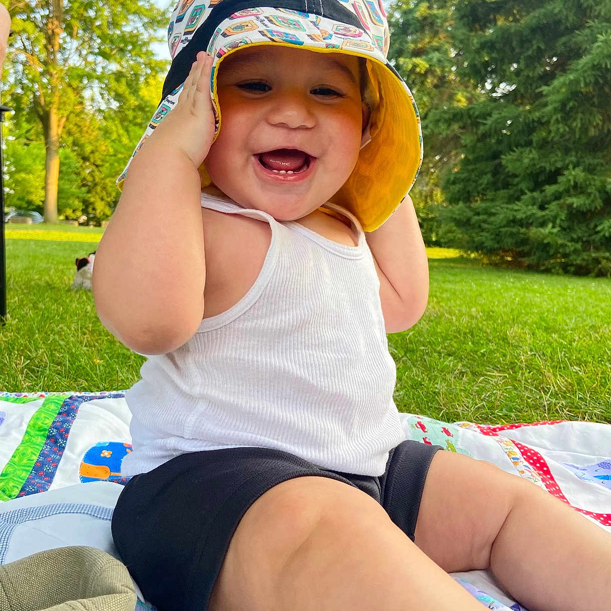 Joel joined the competition — help win amazing prizes! baby, cap, car, clothing, face, grass, happy, hat, head, nature, outdoors, park, person, photography, plant, portrait, shorts, summer, sunhat, tree