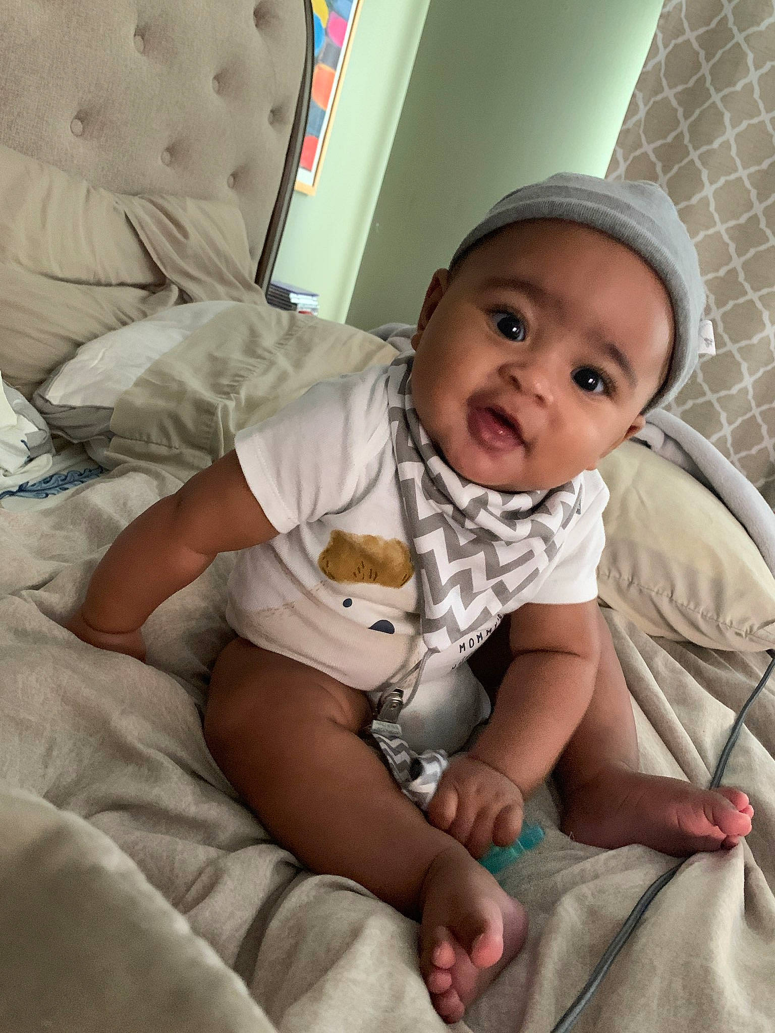 Jakari joined the competition — help win amazing prizes! baby, baby_products, baby_safety, baby_toddler_clothing, bedding, cheek, child, comfort, eye, flooring, fun, happy, head, human_leg, linens, person, sitting, skin, sleeve, smile