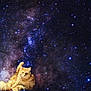 cat, orange_cat, space, galaxy, stars, cosmic, animal, fur, pet, lying_down, background, astronomy, night_sky, cosmos, starfield, cute, fluffy, mammal, relaxing, isolated