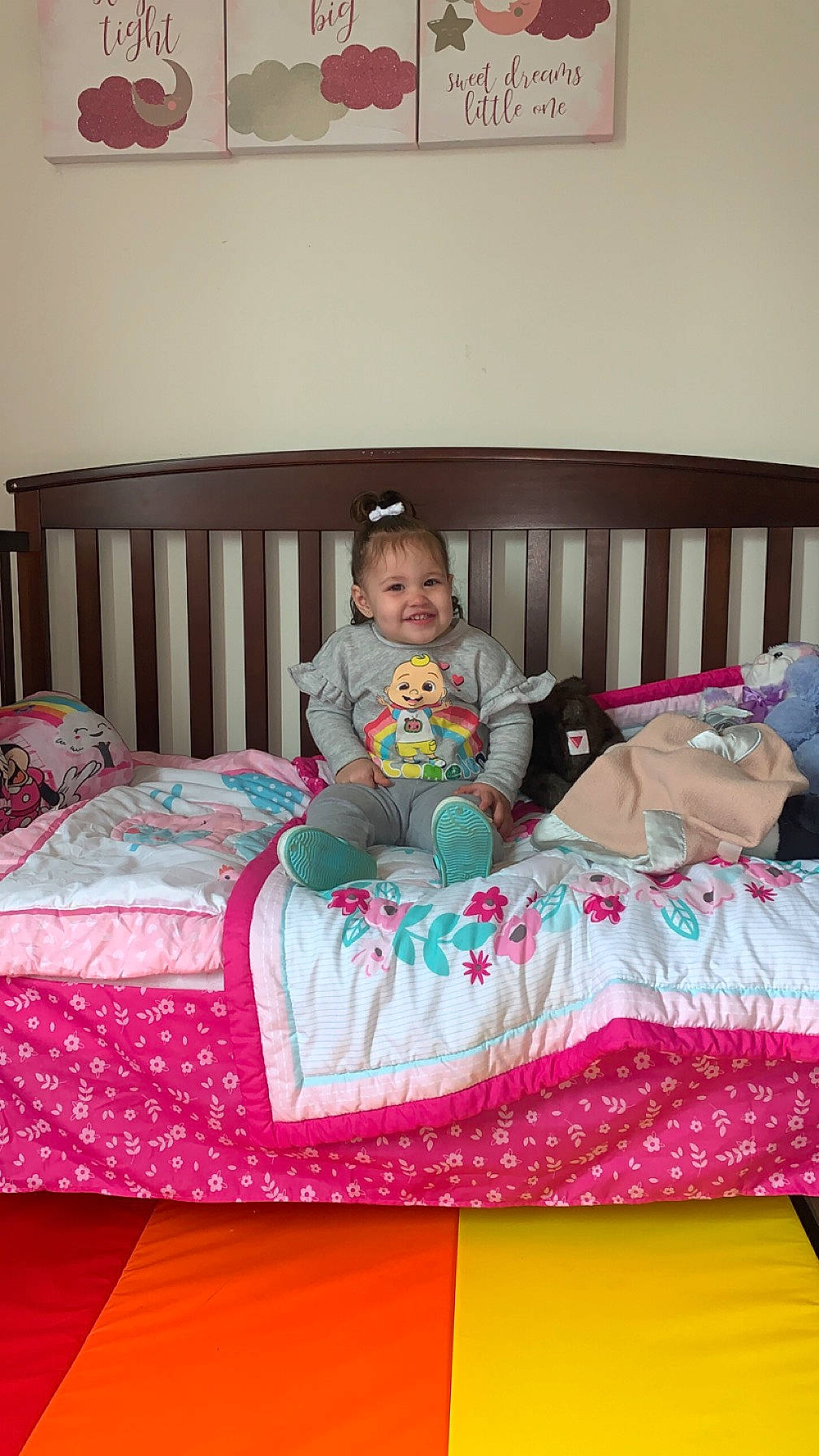 Monika is registered to the contest to win money with this photo: baby_toddler_clothing, bed, bed_frame, bed_sheet, bedding, bedroom, child, comfort, event, flooring, furniture, house, joy, leisure, linens, magenta, pattern, person, pink, room