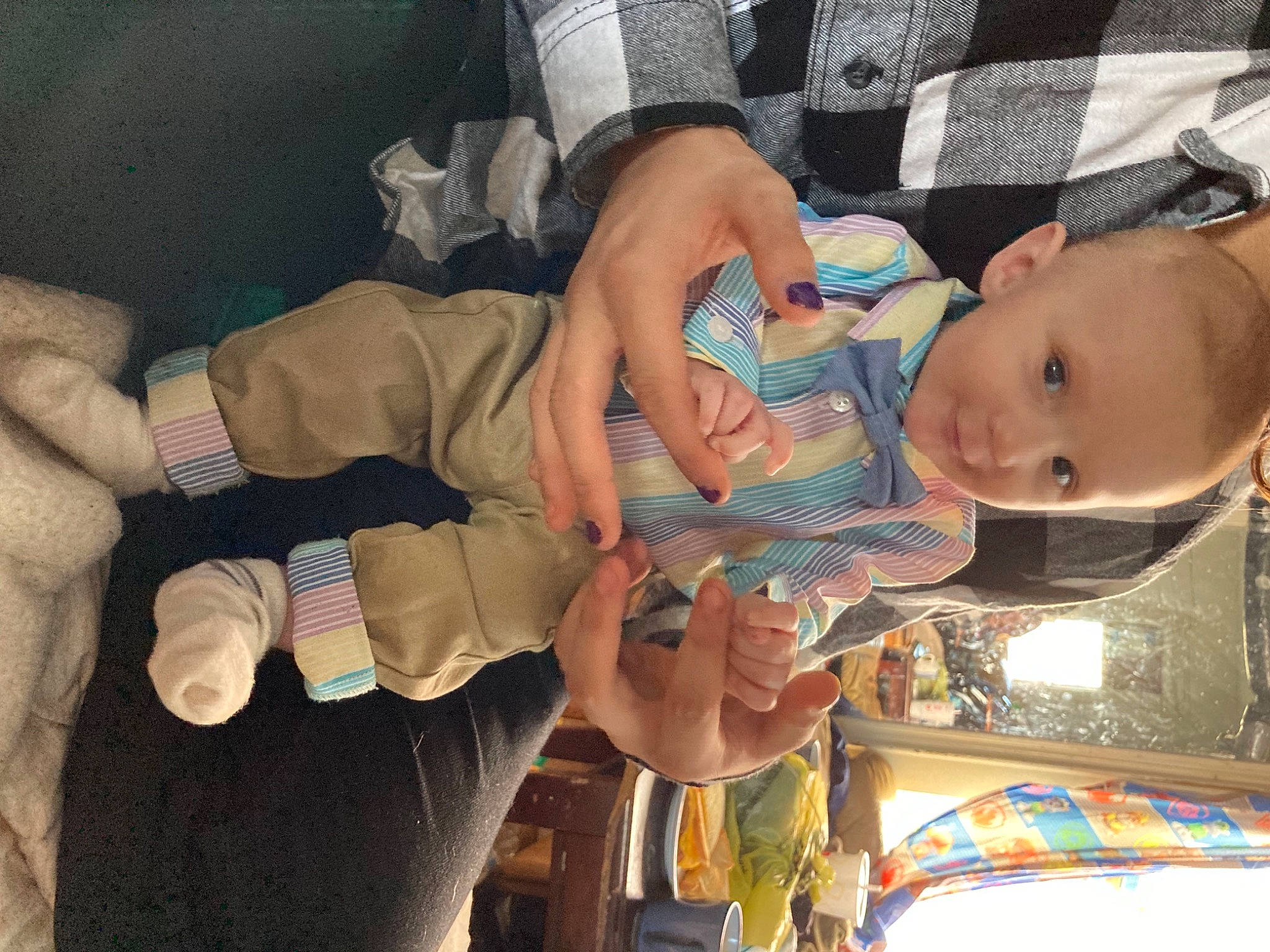 Jack is registered to the contest to win money with this photo: arm, baby, cheek, child, comfort, finger, fun, gesture, hat, human, human_body, joint, leg, mouth, nail, person, skin, textile, thumb, toddler