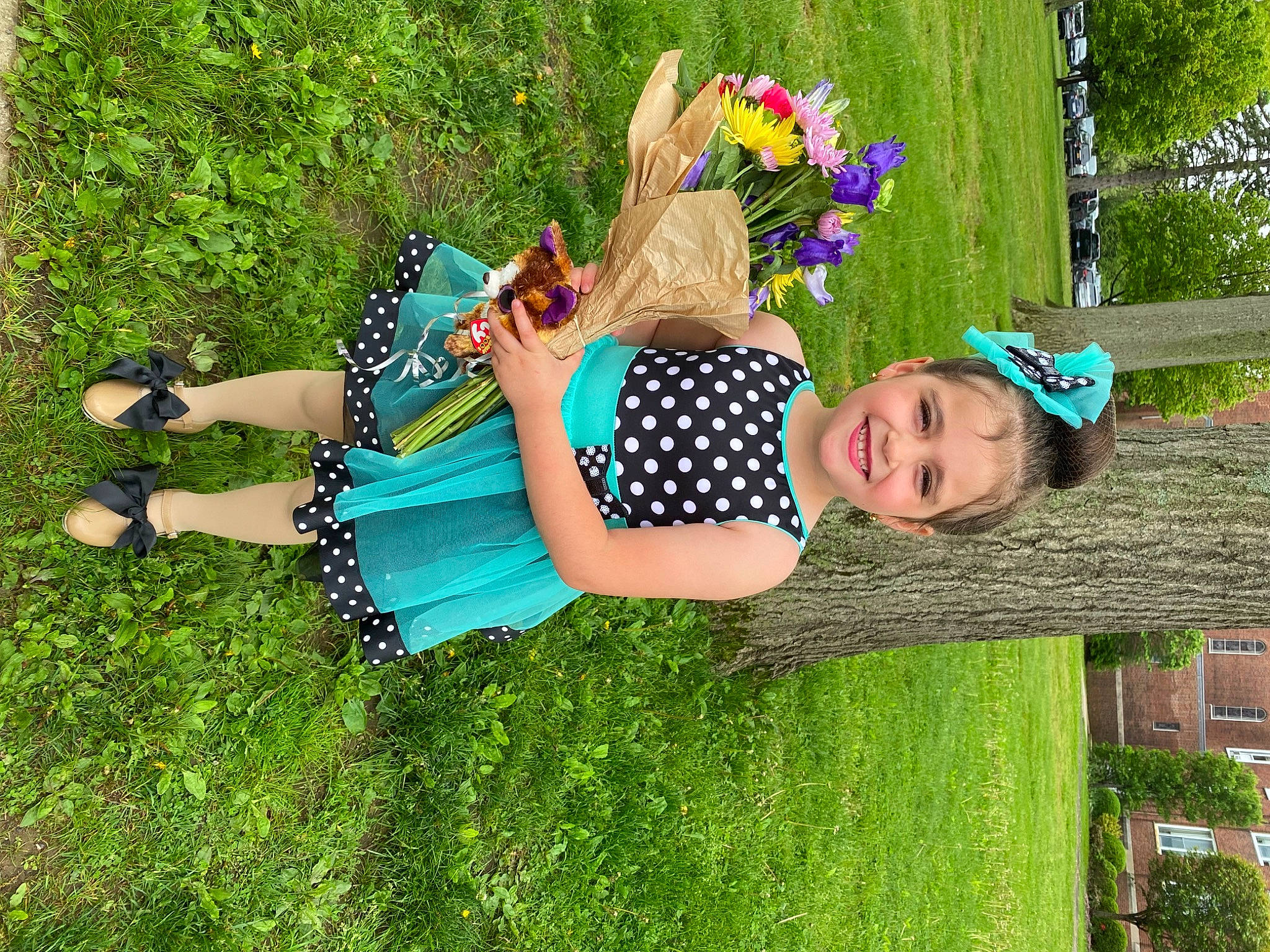 Samantha is registered to the contest to win money with this photo: botany, electric_blue, fun, grass, grass_family, grassland, green, happy, joy, lawn, leaf, leisure, meadow, nature, people_in_nature, person, plant, recreation, smile, summer