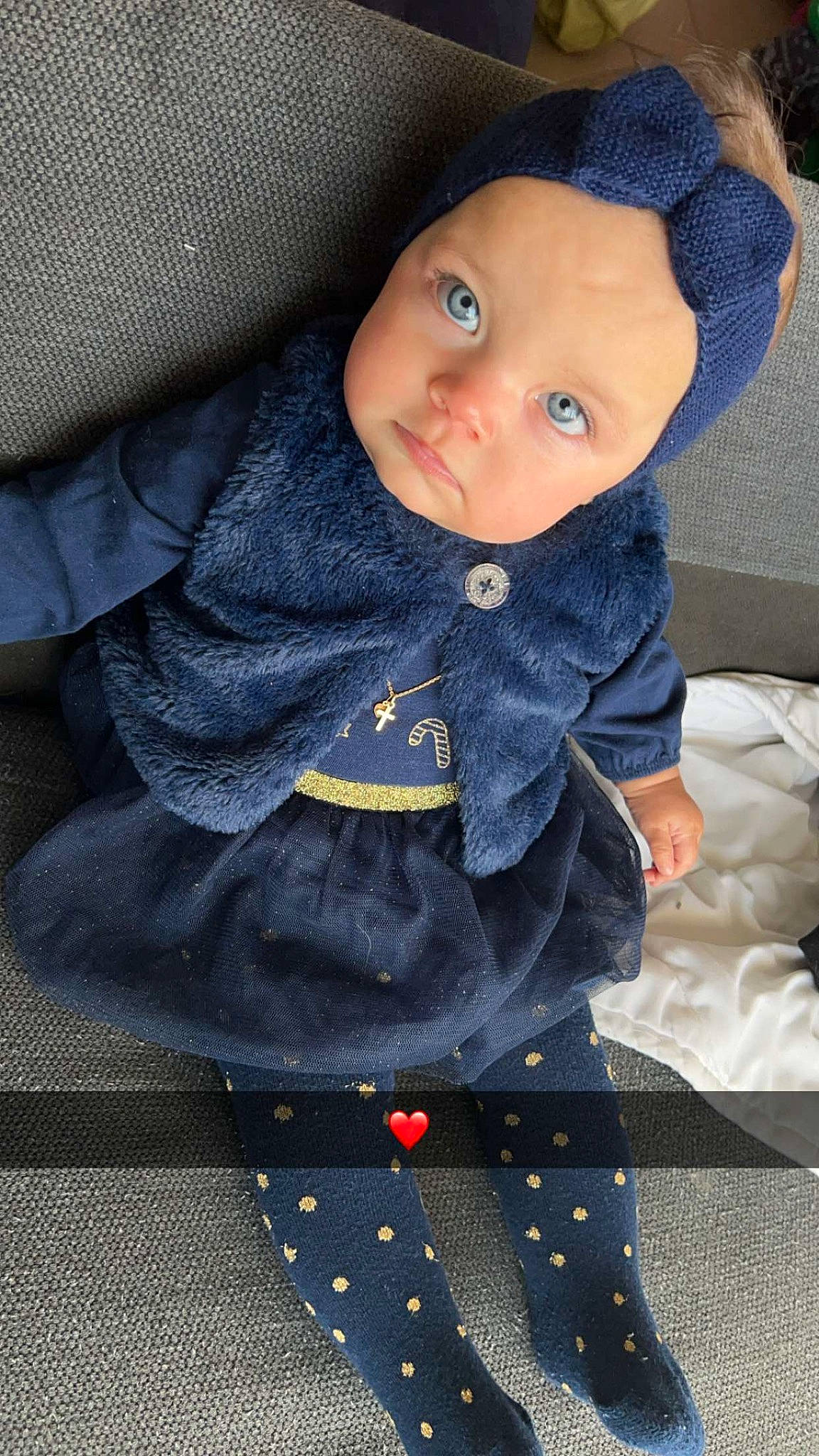 Shanna participe au concours pour gagner de l'argent avec cette photo : baby, baby_toddler_clothing, button, cap, cheek, child, doll, dress, electric_blue, formal_wear, grey, headwear, iris, lip, pattern, person, plaid, sitting, sleeve, textile