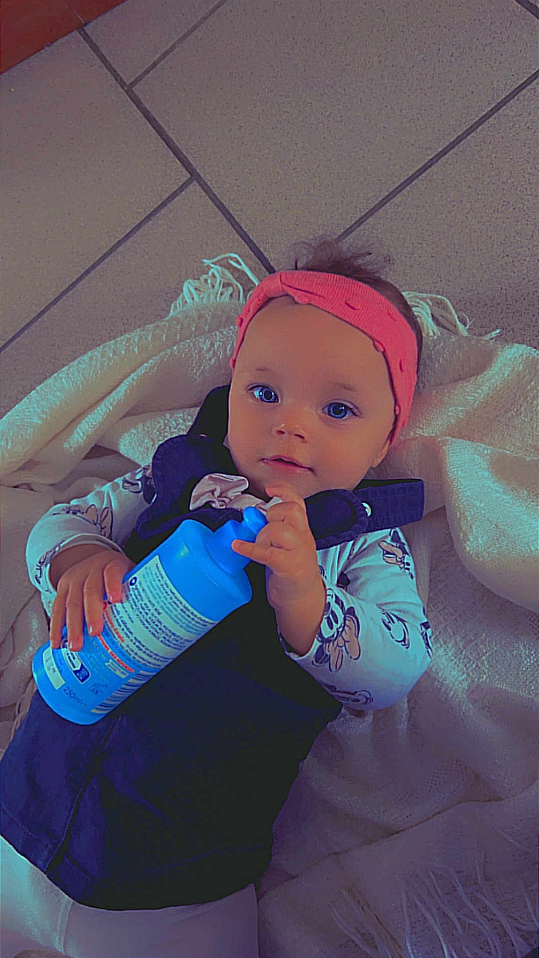 Shanna participe au concours pour gagner de l'argent avec cette photo : accessories, baby, bodypart, bonnet, bottle, cap, clothing, couch, face, finger, furniture, glove, hand, hat, head, lotion, person, photography, portrait, waterbottle