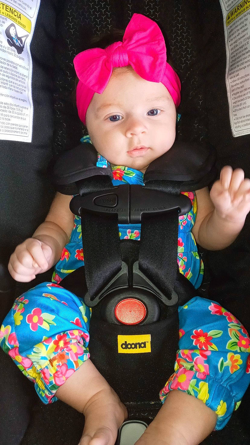 Alaia Jae joined the competition — help win amazing prizes! baby, baby_carriage, baby_toddler_clothing, car_seat, cheek, child, electric_blue, finger, fun, headwear, human_body, organ, outerwear, person, pink, product, skin, sleeve, t_shirt, textile