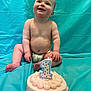 Rosey joined the competition — help win amazing prizes! baby, child, diaper, cake, birthday_candle, number_one, celebration, blue_backdrop, smile, sitting, first_birthday, infant, cute, happy, food, cream, party, one_year_old, portrait, indoors