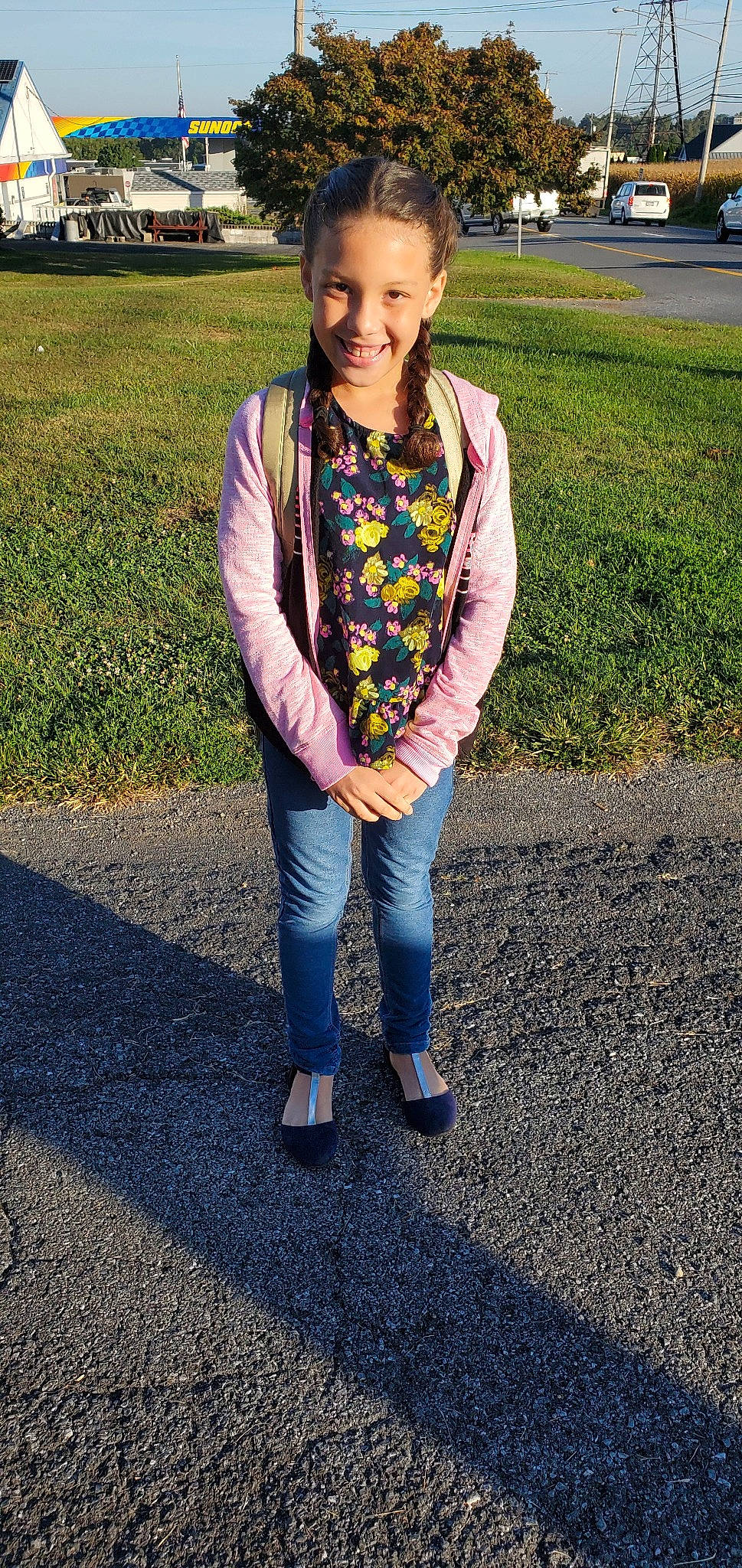 Olivia joined the competition — help win amazing prizes! blazer, child, clothing, denim, footwear, fun, grass, jacket, jeans, joy, outerwear, pattern, person, scarf, shoe, smile, standing, sweater, textile, toddler