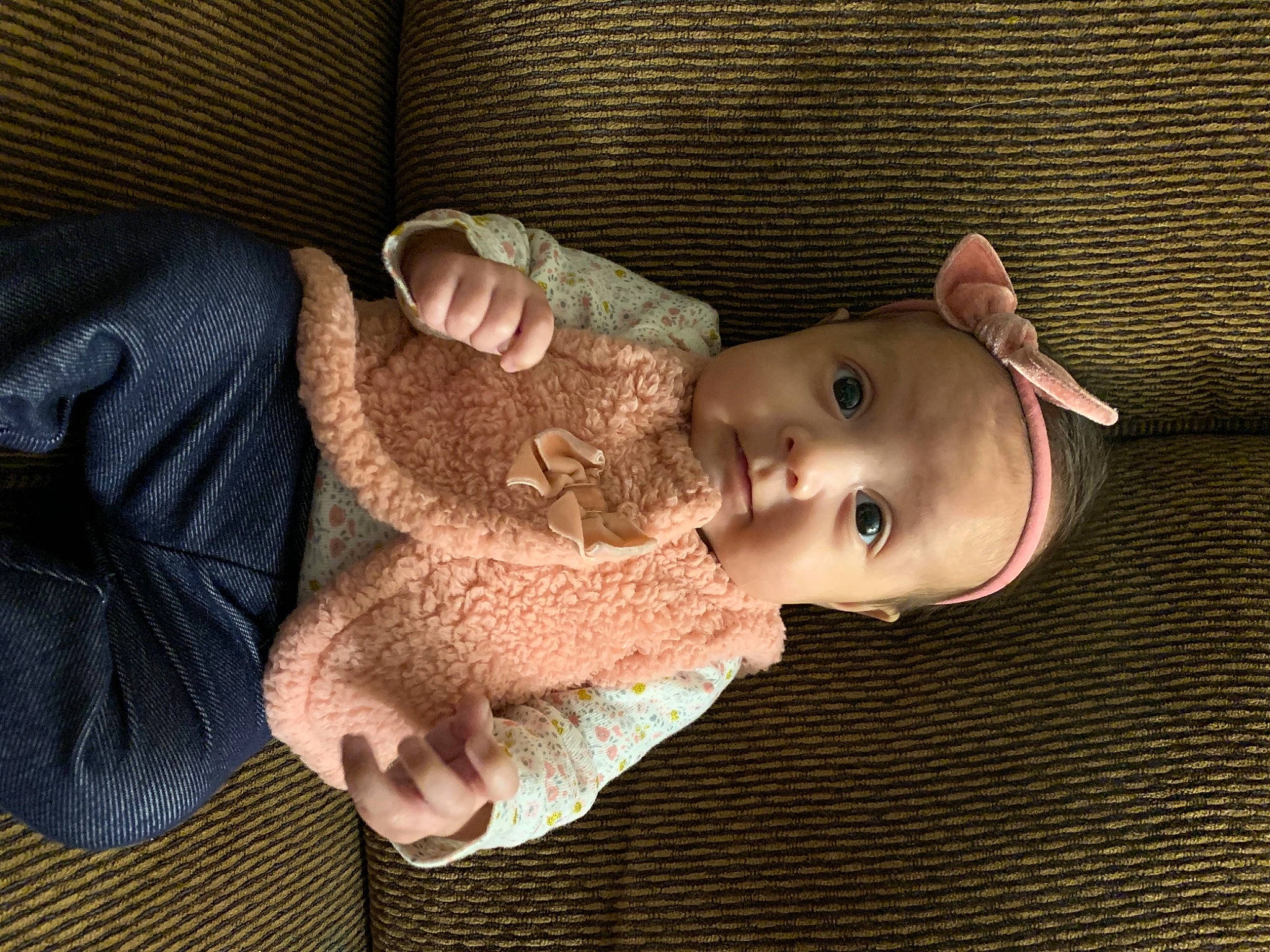 Xena is registered to the contest to win money with this photo: baby, baby_toddler_clothing, cheek, couch, craft, ear, knitting, lip, person, skin, sweater, textile, thread, wool, woolen