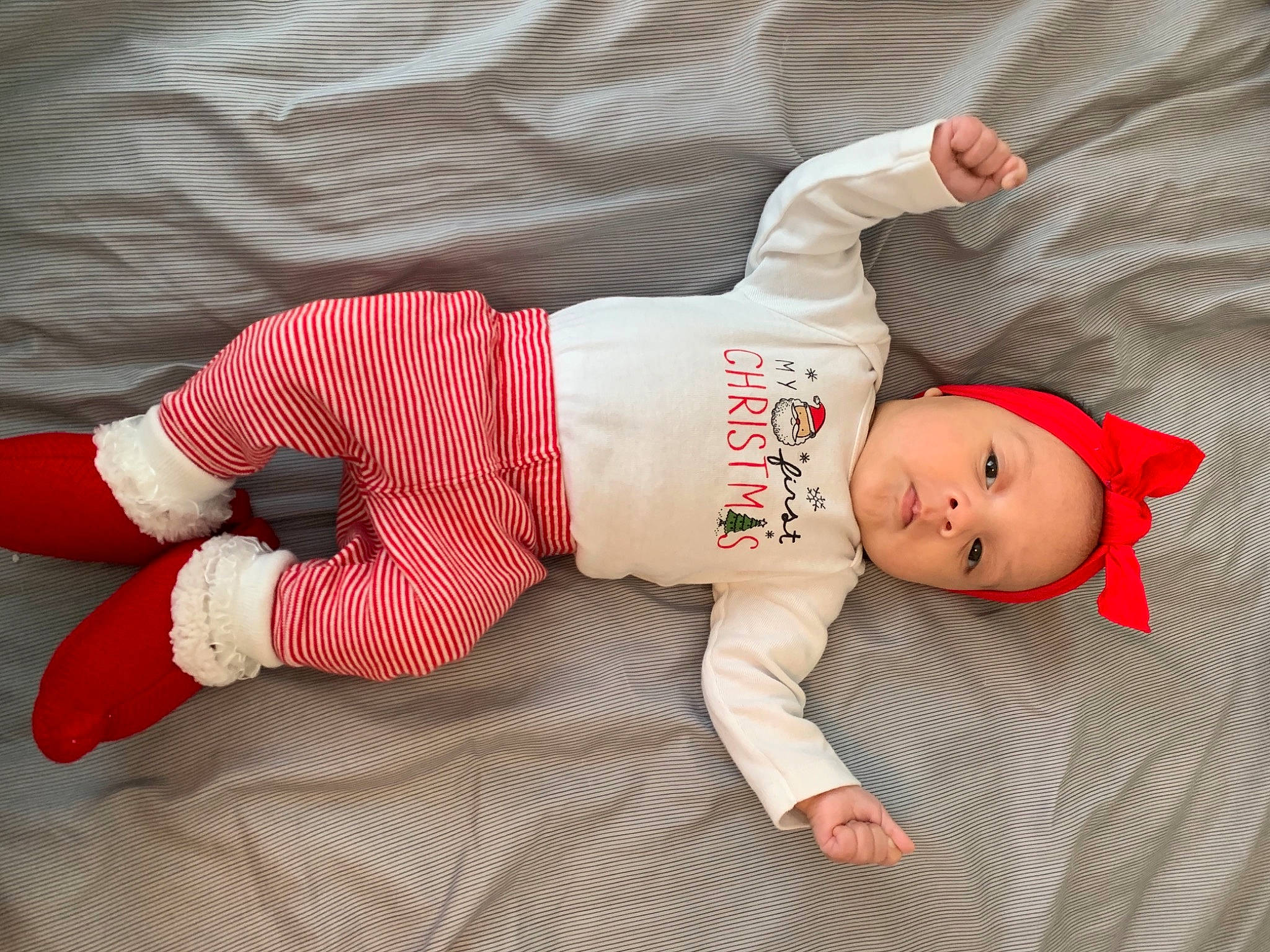Xena is registered to the contest to win money with this photo: baby, baby_products, baby_safety, baby_toddler_clothing, baby_toys, carmine, child, comfort, headwear, human, nightwear, overall, person, sleeve, sock, stuffed_toy, toddler
