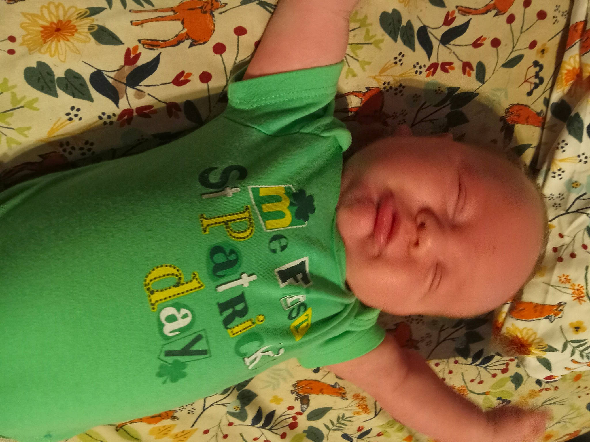 Alonzo is registered to the contest to win money with this photo: baby, baby_products, baby_toddler_clothing, bedding, bedtime, cheek, child, comfort, grass, green, happy, head, linens, pattern, person, room, skin, sleeve, t_shirt, toddler