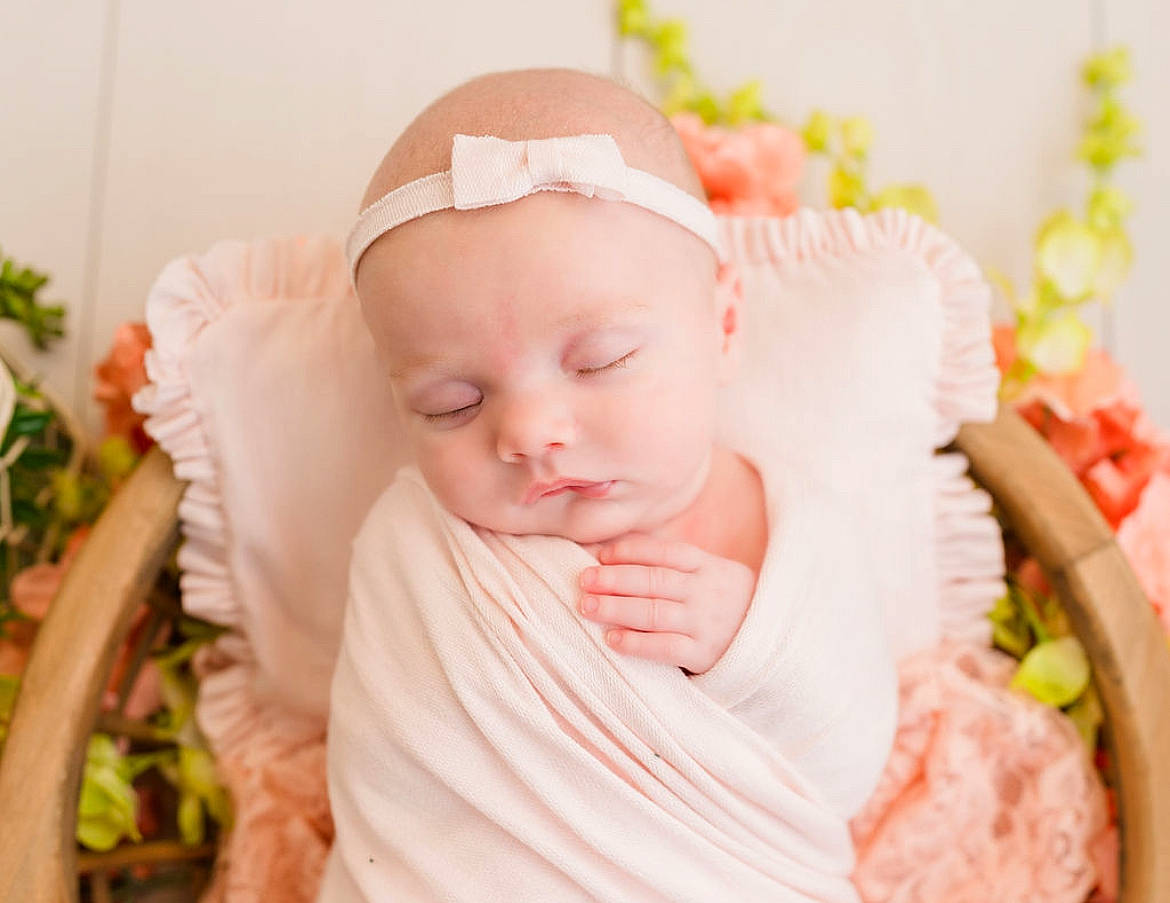 Millie joined the competition — help win amazing prizes! baby, baby_products, baby_toddler_clothing, cap, cheek, child, comfort, dress, event, face, grass, happy, hat, head, headband, headpiece, person, pink, plant, skin