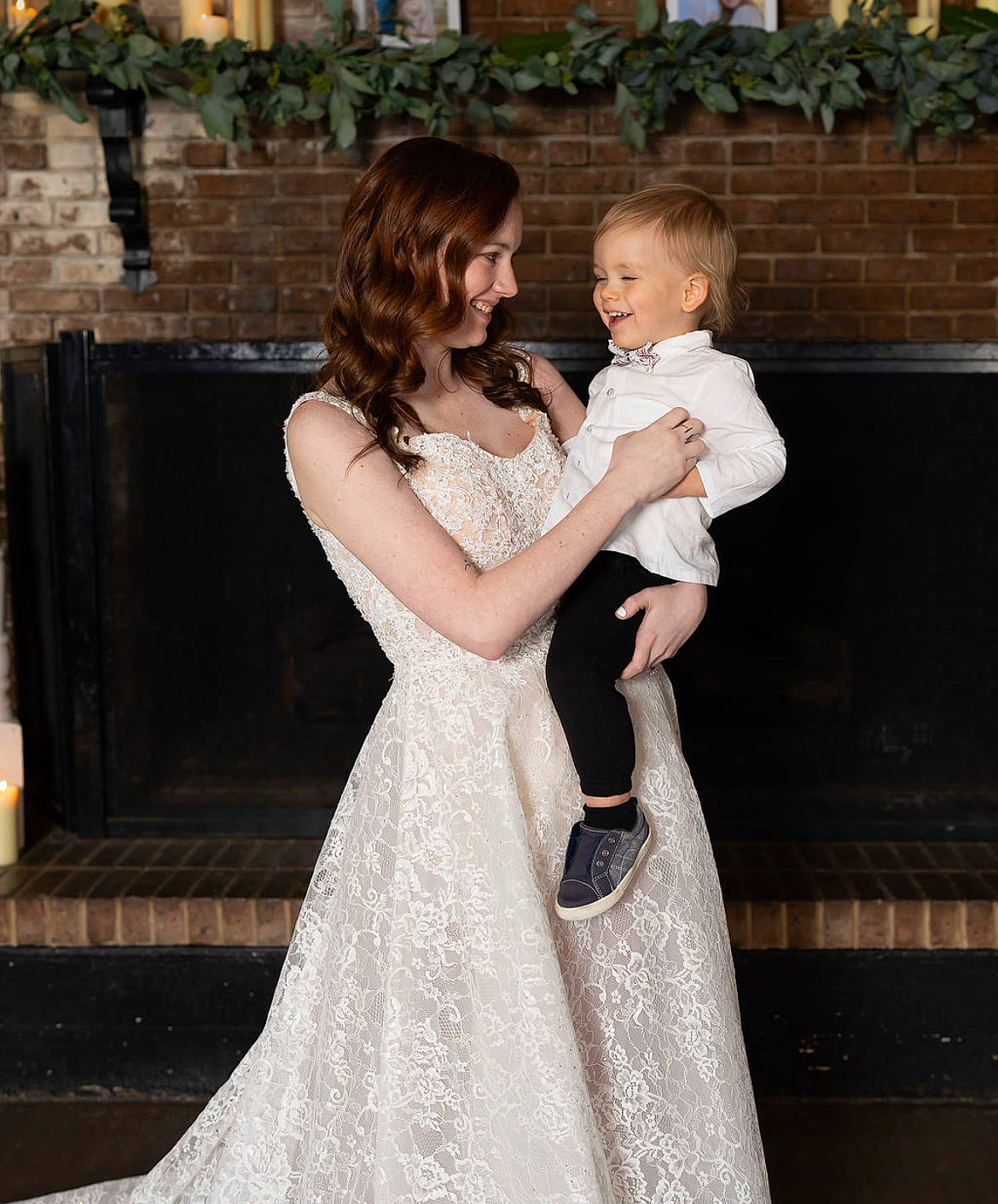 Ryland joined the competition — help win amazing prizes! bridal_clothing, bridal_party_dress, bride, dress, fashion, flash_photography, formal_wear, gesture, gown, hair, hand, happy, joy, one_piece_garment, person, shoulder, smile, standing, style, waist