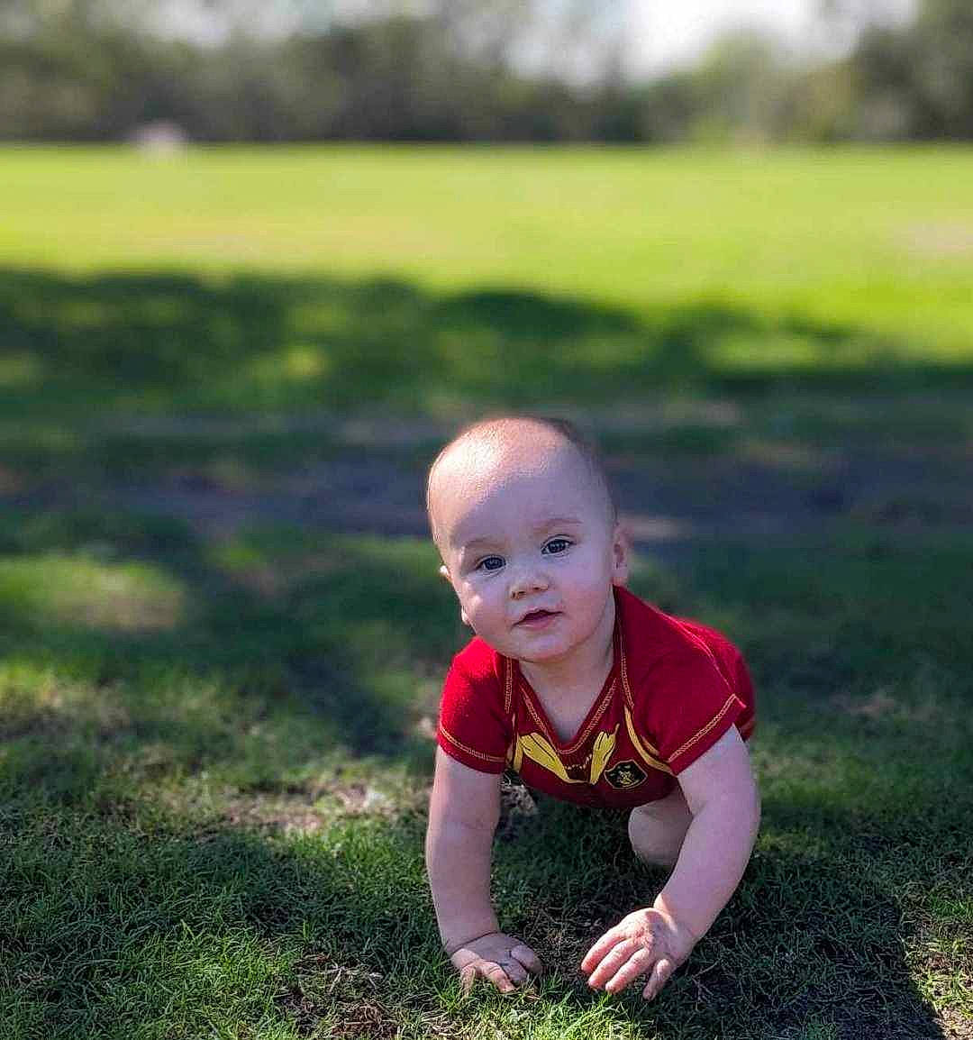 Davion joined the competition — help win amazing prizes! baby, baby_toddler_clothing, crawling, dress, flash_photography, flooring, grass, grassland, happy, landscape, lawn, meadow, people_in_nature, person, plant, recreation, smile, sunlight, toddler, tree