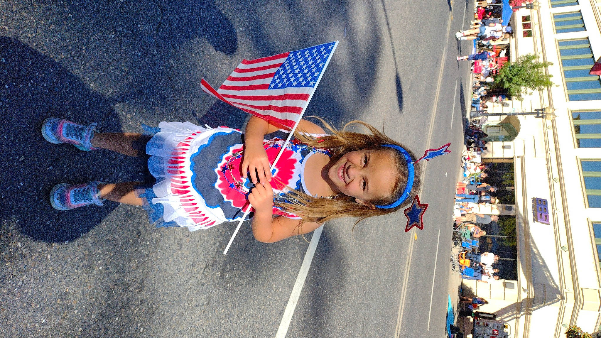 Olivia joined the competition — help win amazing prizes! asphalt, carmine, electric_blue, event, eyewear, festival, flag, flag_day_usa, flag_of_the_united_states, fun, holiday, human_leg, joy, pedestrian, person, pole, public_event, recreation, smile, street