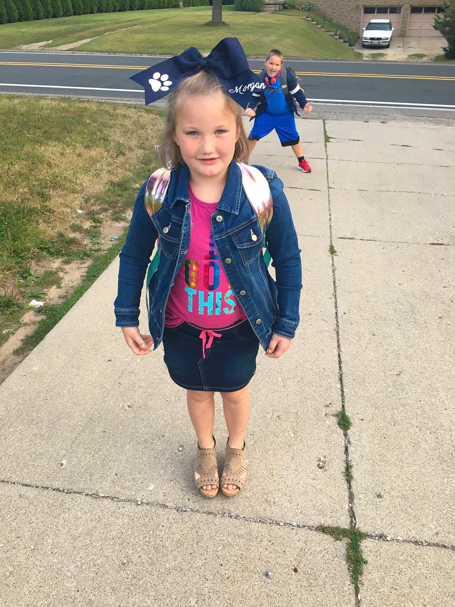 Morgan is registered to the contest to win money with this photo: child, electric_blue, jacket, joy, leisure, outerwear, person, photography, plant, recreation, skin, smile, snapshot, style, toddler, tourism, uniform, vacation, walking