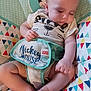 baby, bed, blanket, bodypart, clothing, couch, cushion, face, finger, furniture, hand, head, homedecor, newborn, person, photography, portrait, quilt, sitting, t_shirt
