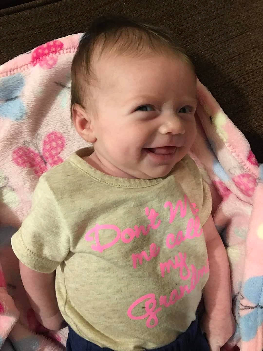 Daniella is registered to the contest to win money with this photo: baby, baby_products, baby_toddler_clothing, cheek, child, ear, face, facial_expression, head, lip, neck, nose, person, pink, skin, smile, toddler