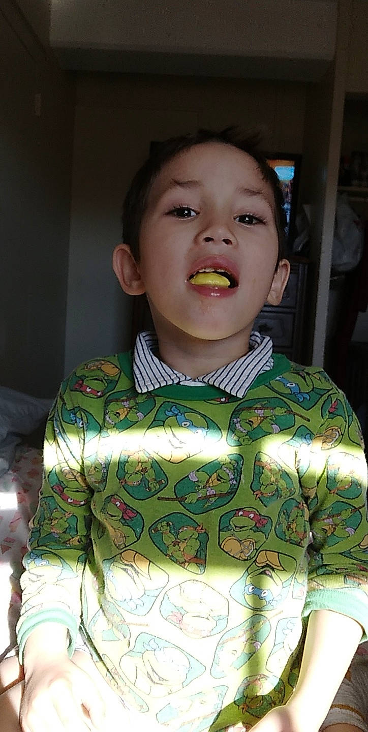 Vance is registered to the contest to win money with this photo: art, cheek, chest, child, chin, costume, event, eyebrow, eyelash, fun, happy, human_body, jaw, neck, nose, pattern, person, sleeve, smile, t_shirt