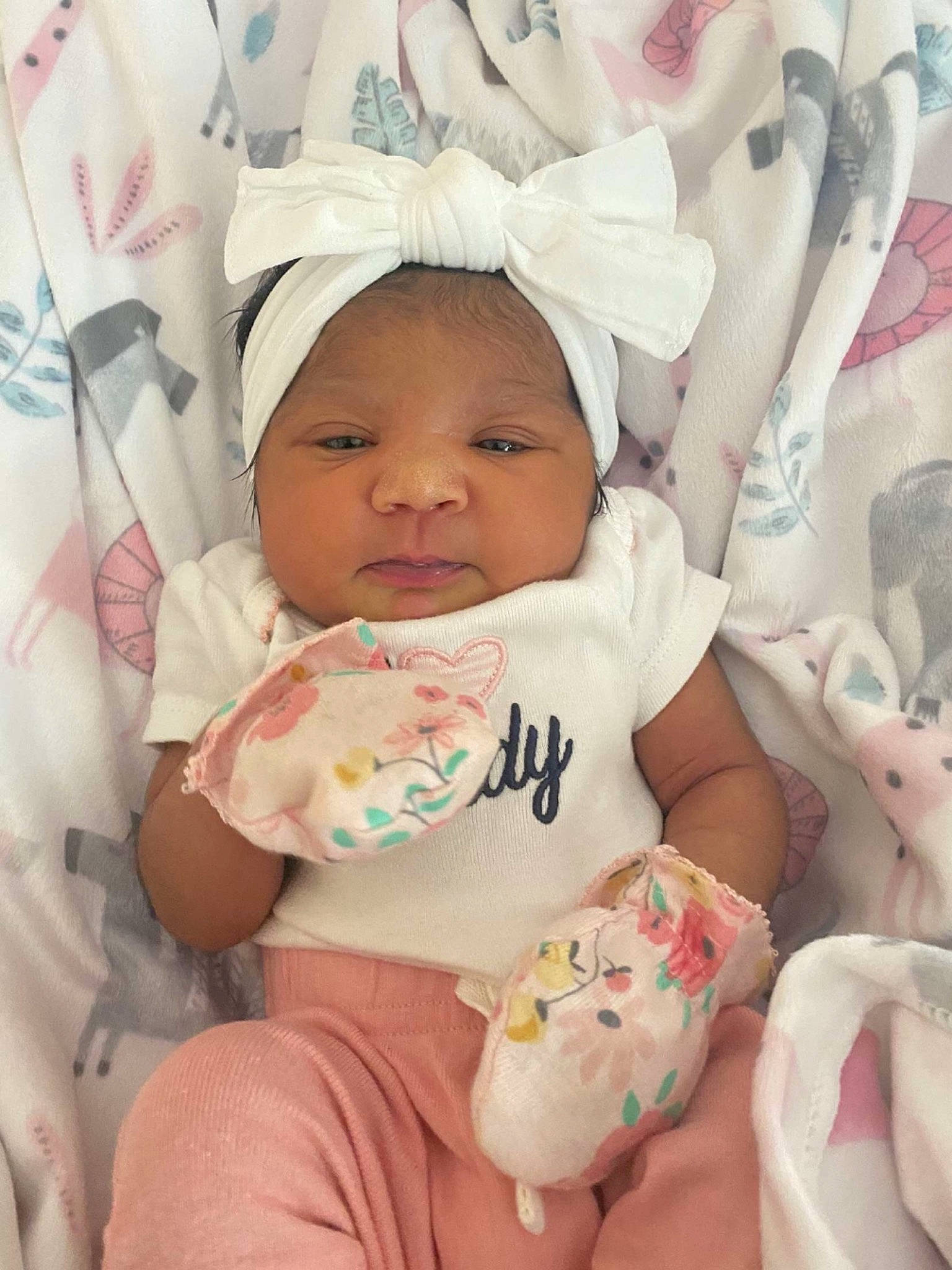 Kalia is registered to the contest to win money with this photo: baby, baby_products, baby_sleeping, baby_toddler_clothing, cheek, child, comfort, event, happy, hat, headwear, linens, mouth, person, pink, room, skin, smile, textile, toddler