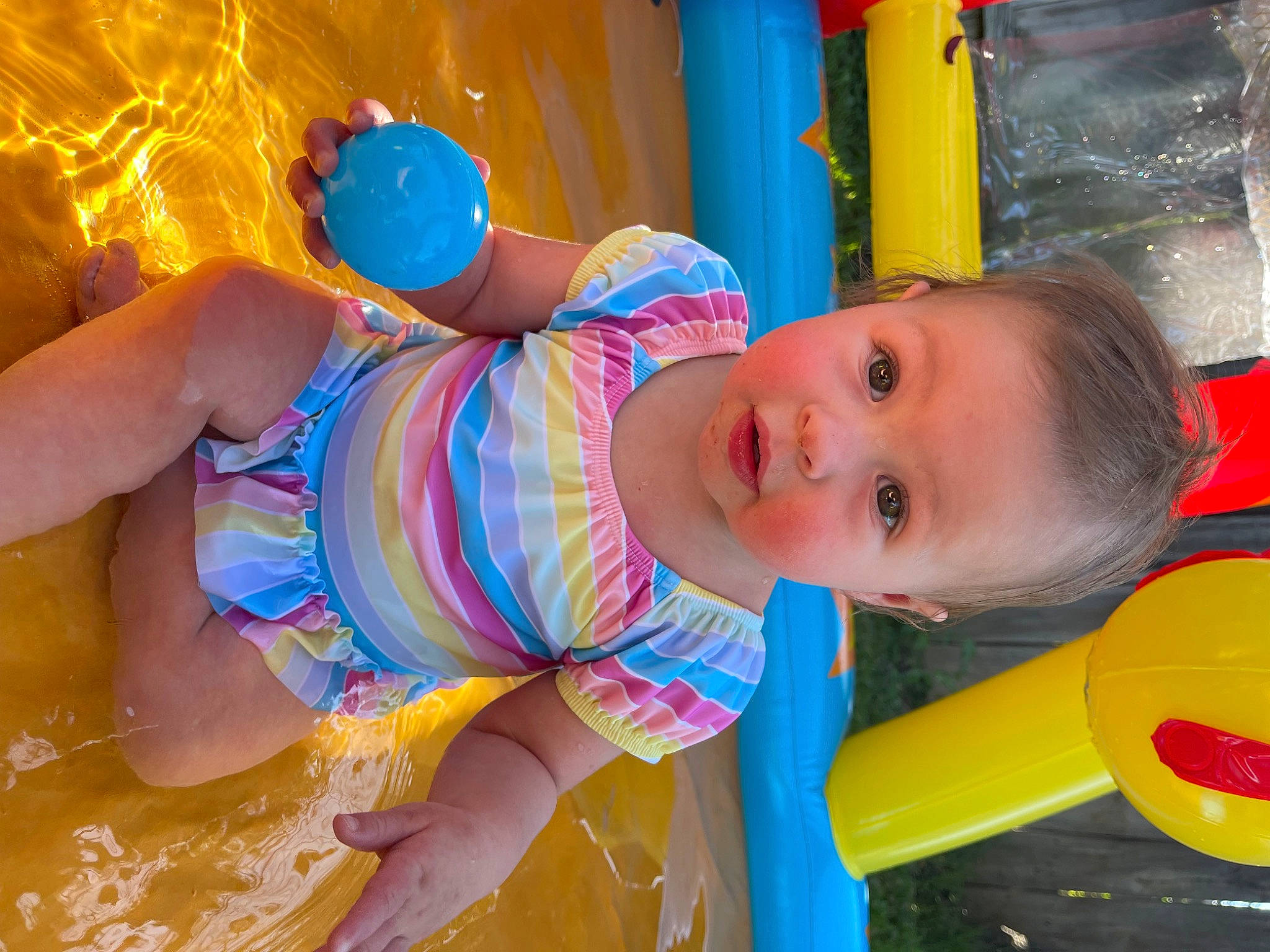 Ellianna is registered to the contest to win money with this photo: baby, baby_playing_with_toys, baby_products, baby_toddler_clothing, cheek, child, electric_blue, eye, fun, happy, human_body, leisure, orange, person, play, product, skin, smile, toddler, toy