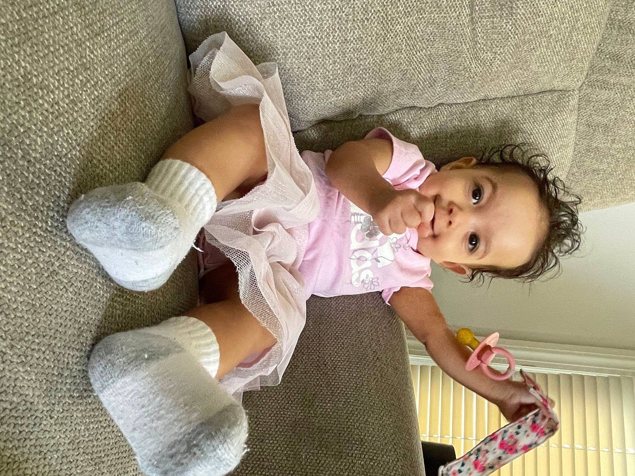 Mariah joined the competition — help win amazing prizes! baby, baby_products, baby_toddler_clothing, cheek, child, comfort, dress, eyelash, happy, leg, linens, pattern, person, pink, room, skin, sleeve, sock, textile, thigh