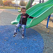 Khaza joined the competition — help win amazing prizes! autumn, black_jacket, blue_rubber_floor, casual_clothing, child, childhood, curious_expression, daylight, fun, green_slide, jeans, leisure, outdoor, park, playground, recreation, slide, sneakers, trees, young_boy