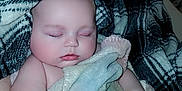 Ryder is registered to the contest to win money with this photo: baby, baby_toddler_clothing, cap, cheek, child, chin, comfort, doll, eye, eyebrow, eyelash, headgear, iris, linens, lip, mouth, skin, textile, toddler, wool