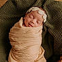 Kamille joined the competition — help win amazing prizes! newborn, baby, sleeping, wrapped, blanket, headband, pearls, basket, knitted, green, peach, cozy, cute, infant, portrait, peaceful, soft, fabric, indoors, resting