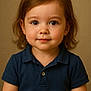 blue_shirt, brown_hair, casual_clothing, child, closeup, curious_eyes, cute, face, indoor, innocent, person, polo_shirt, portrait, short_sleeves, smile, soft_lighting, studio, toddler, warm_background, young_child