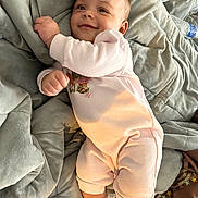 Cairo is registered to the contest to win money with this photo: baby, bed, bedroom, blanket, bodypart, cushion, face, finger, furniture, hand, head, homedecor, indoors, newborn, person, photography, portrait, quilt, room, sleeping