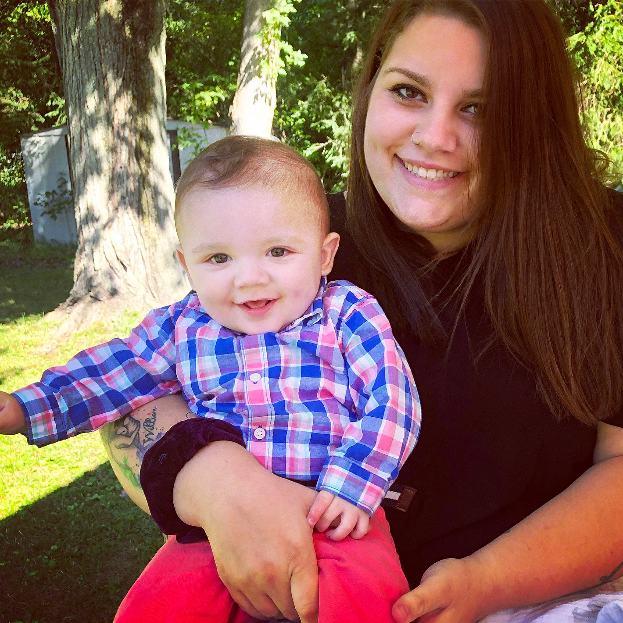 Lewis joined the competition — help win amazing prizes! child, design, family, grass, happy, joy, lap, love, pattern, people, person, photography, plaid, recreation, sibling, sitting, smile, summer, toddler, tree