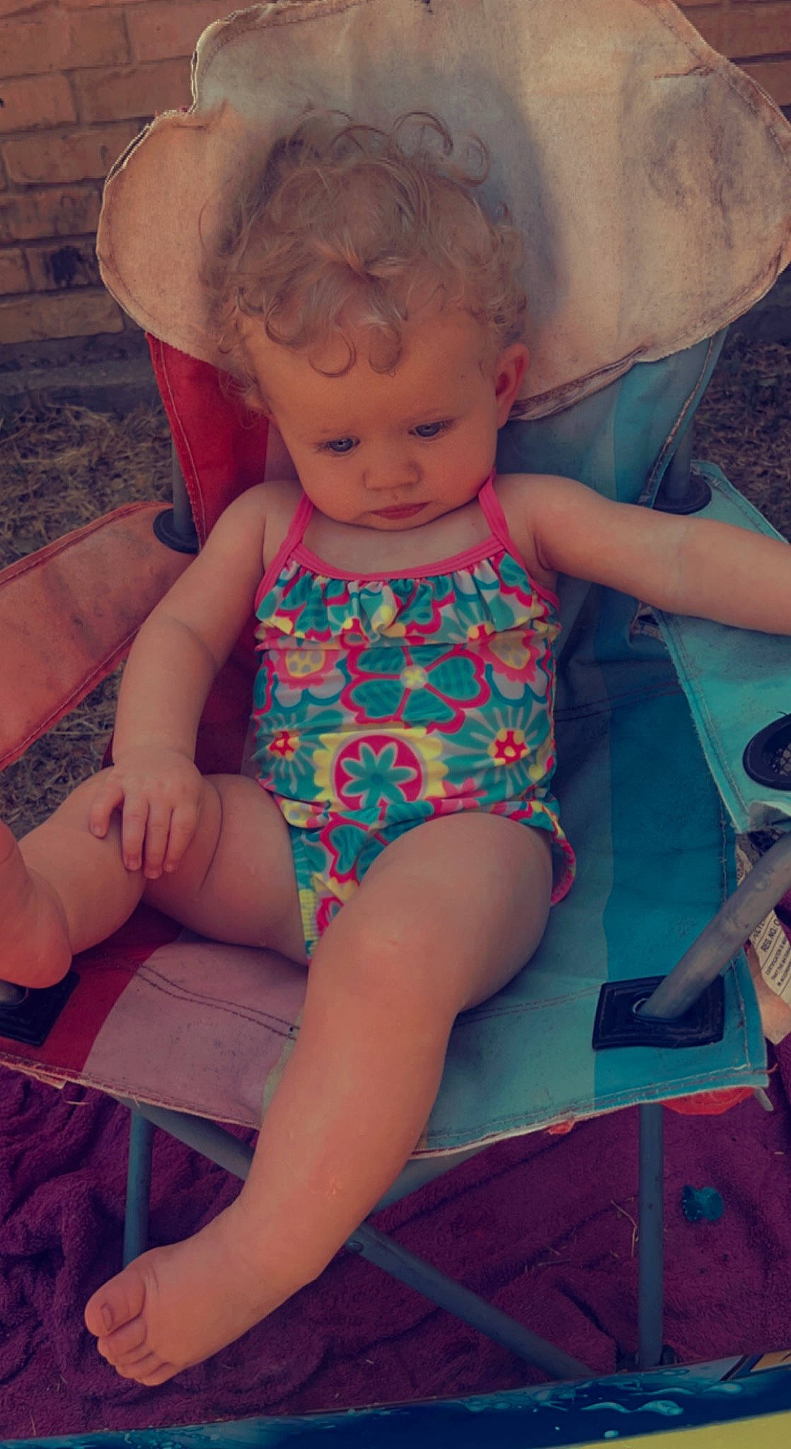 Everlynn is registered to the contest to win money with this photo: arm, baby_toddler_clothing, comfort, eye, finger, glasses, hand, head, human_body, iris, joint, leg, mouth, muscle, neck, person, pink, shoulder, skin, textile