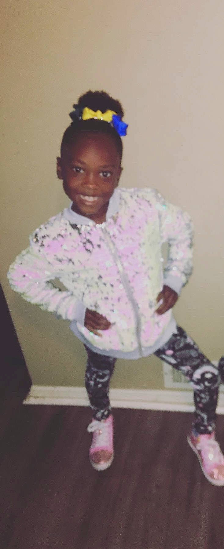 Neariyah is registered to the contest to win money with this photo: baby_toddler_clothing, child, clothing, costume, electric_blue, fashion_accessory, fashion_design, fun, happy, jewellery, joy, magenta, outerwear, pattern, person, pink, purple, sleeve, smile, sock