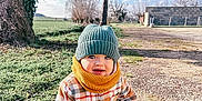 Nate a rejoint le concours — aidez-le/la à gagner de superbes lots ! beanie, boy, cap, child, clothing, crawling, face, happy, hat, head, male, pants, person, photography, plant, portrait, sitting, smile, soil, tree