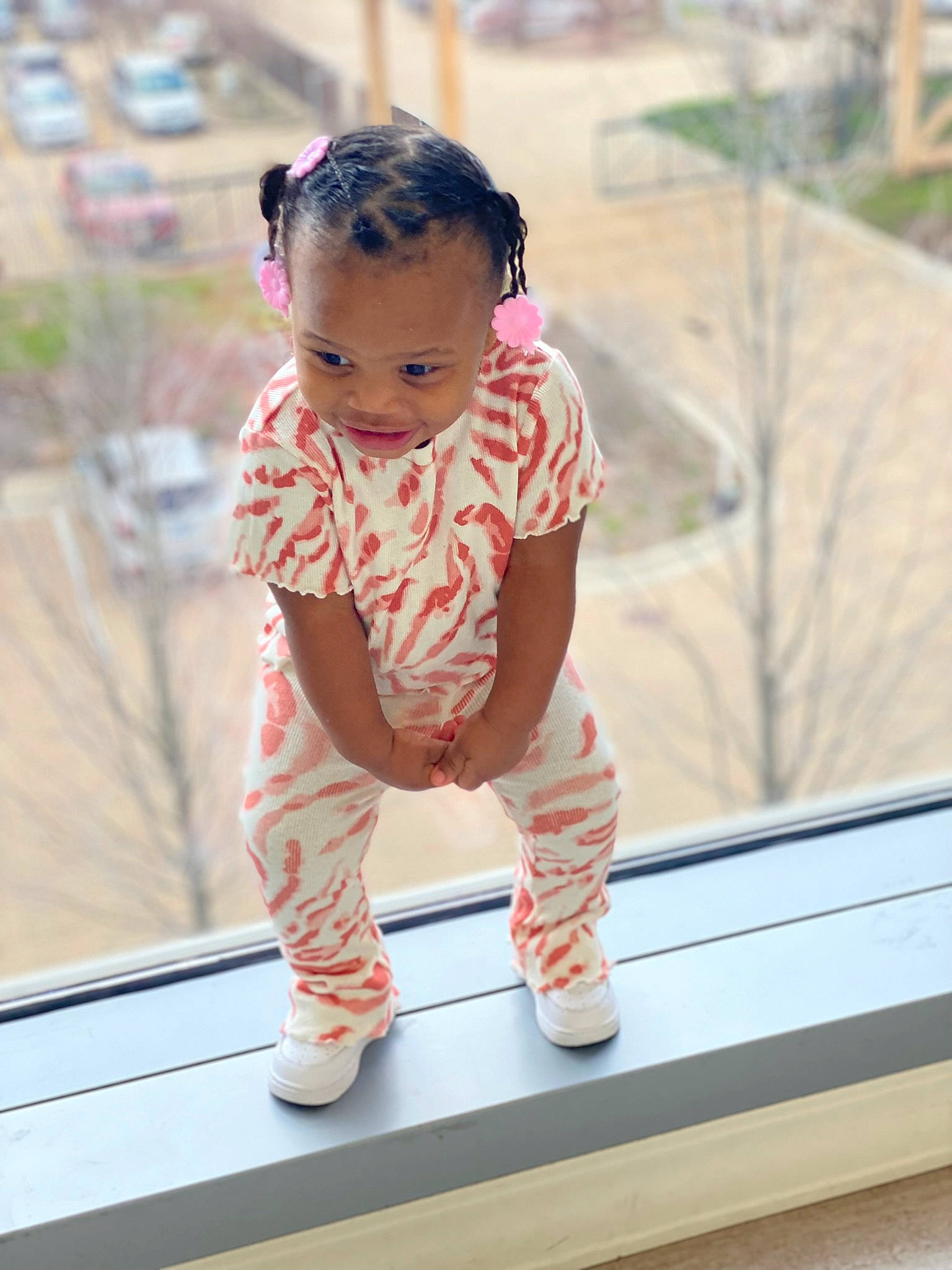 Jahnyla joined the competition — help win amazing prizes! baby, baby_toddler_clothing, child, crawling, flooring, foot, fun, happy, human_leg, knee, leisure, pattern, person, recreation, sitting, skin, sleeve, sock, thigh, toddler