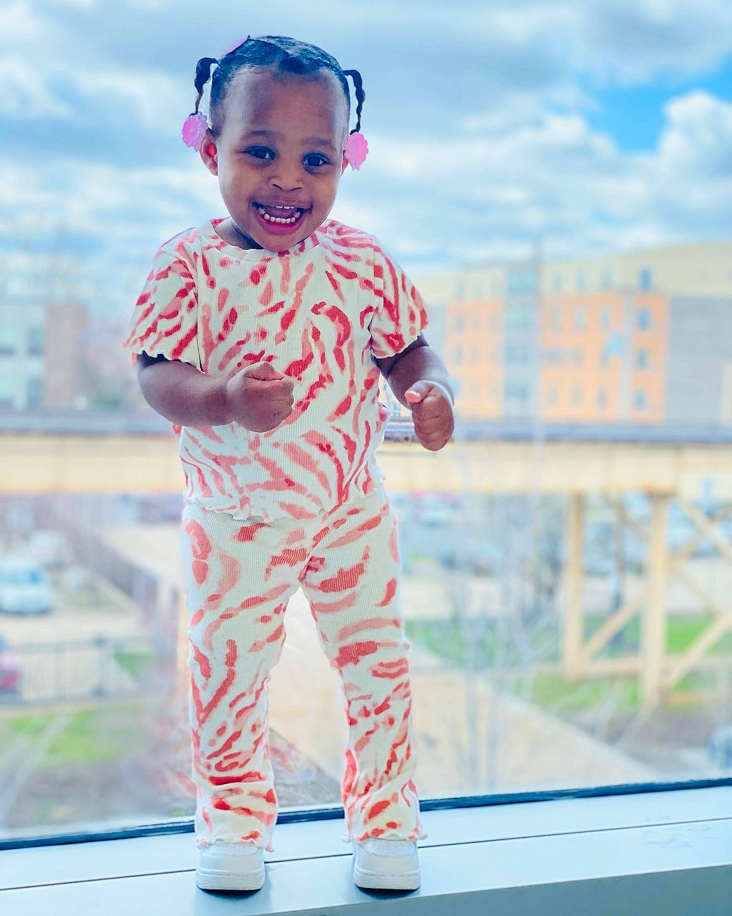 Jahnyla joined the competition — help win amazing prizes! azure, baby, baby_toddler_clothing, blue, child, cloud, cool, electric_blue, fun, happy, joy, leisure, magenta, person, photograph, recreation, shoulder, sky, sleeve, smile