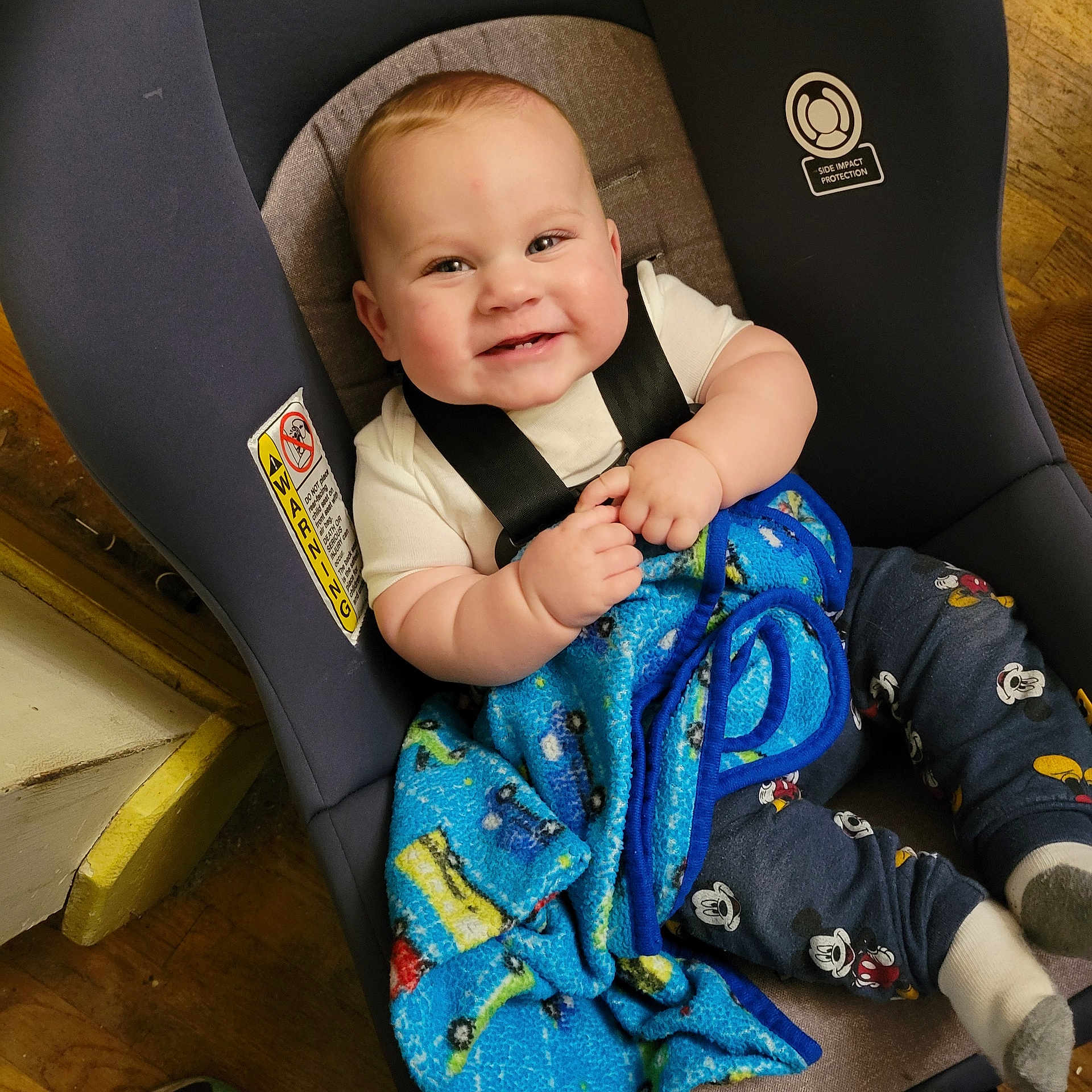 Carl joined the competition — help win amazing prizes! baby, blanket, car, car_interior, carseat, chair, clothing, couch, cushion, face, furniture, head, homedecor, pants, person, photography, portrait, sitting, transportation, vehicle
