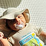 Muhammad joined the competition — help win amazing prizes! baby, pacifier, hat, tshirt, disney_pixar, toy_story, woody, mike_wazowski, sully, smile, infant, child, portrait, indoor, soft_light, blanket, cute, lying_down, closeup, apparel
