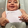 baby, infant, smiling, white_tank_top, baby_seat, gray, stars, crescent_moon, pacifier, cute, chubby_cheeks, happy, hands, closeup, indoor, child, person, seatbelt, infant_clothing, portrait
