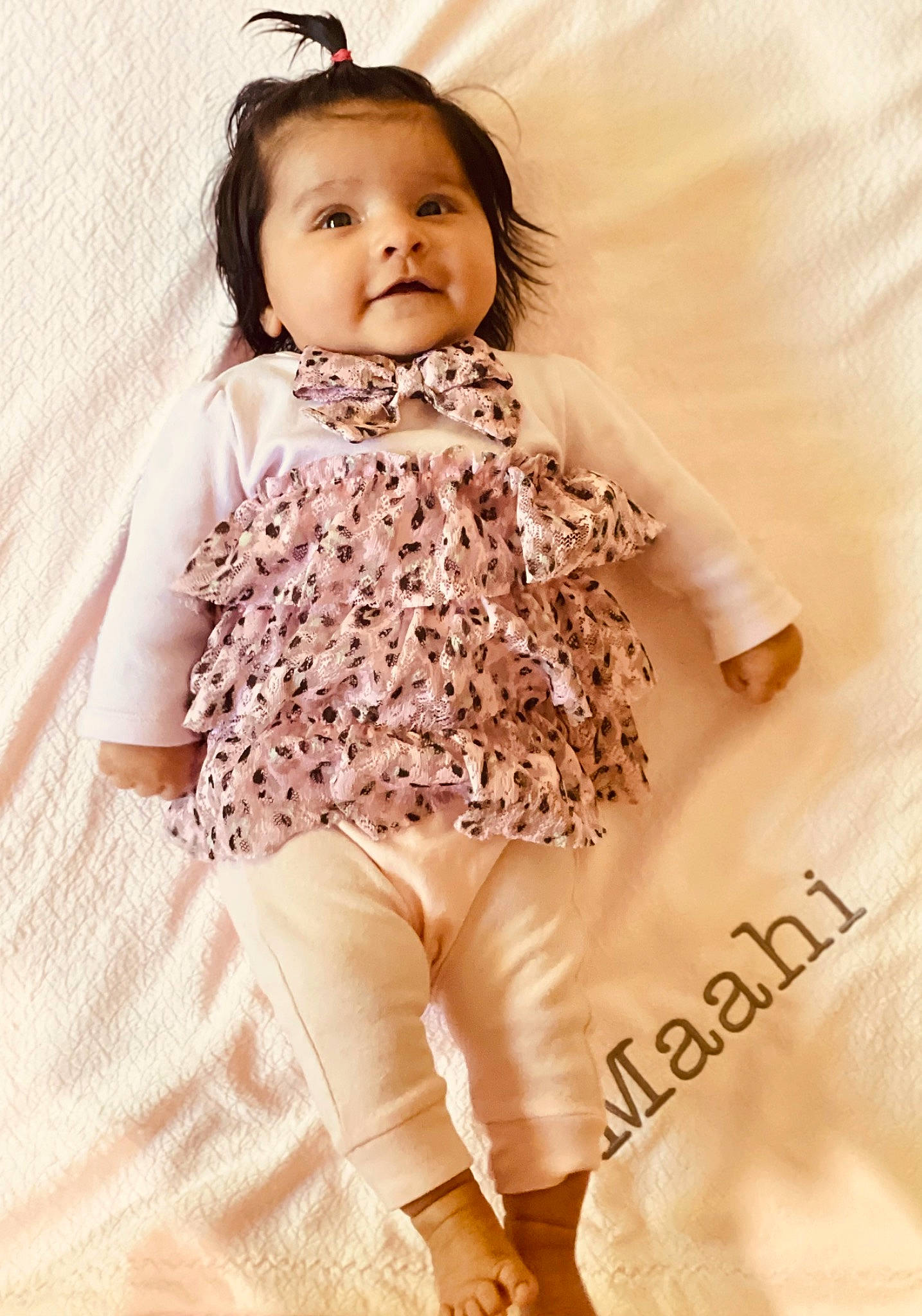 Maahi is registered to the contest to win money with this photo: arm, baby, baby_toddler_clothing, collar, day_dress, eye, face, fashion_design, flash_photography, gesture, hand, happy, head, human_body, pattern, person, skin, sleeve, thigh, toddler