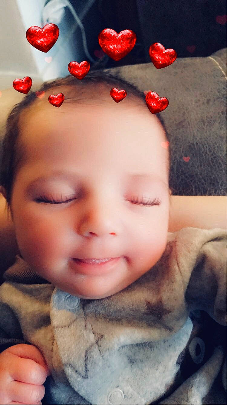 Zophia joined the competition — help win amazing prizes! baby, cheek, child, ear, eye, face, facial_expression, finger, forehead, hair_accessory, head, lip, mouth, nose, person, photography, red, skin, smile, toddler