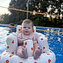 Alden joined the competition — help win amazing prizes! baby, child, cute, cute_baby, float, fun, infant, inflatable, outdoor, playful, pool, relaxing, sitting, summer, sunlight, swimming, tiger_print, trees, vacation, water