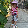 Ella'Mia joined the competition — help win amazing prizes! toddler, child, sidewalk, urban, plants, greenery, sunhat, pink, swimsuit, minnie_mouse, curly_hair, sandals, summer, daylight, fence, buildings, street, exploration, outdoor, casual