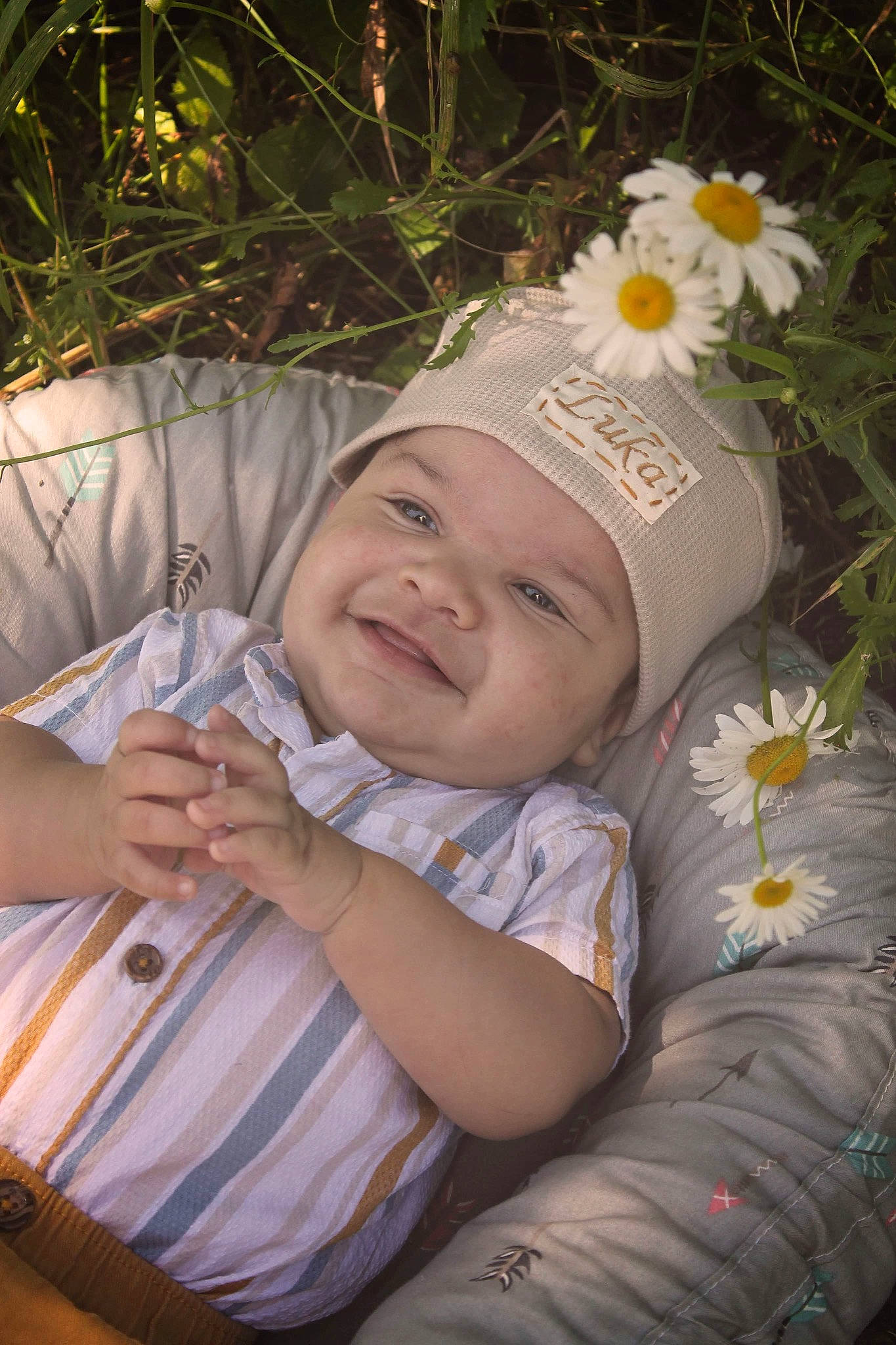 Luka joined the competition — help win amazing prizes! baby, eye, facial_expression, flash_photography, flower, gesture, grass, hairstyle, happy, headwear, iris, people_in_nature, person, petal, plant, product, skin, smile, summer, sunlight