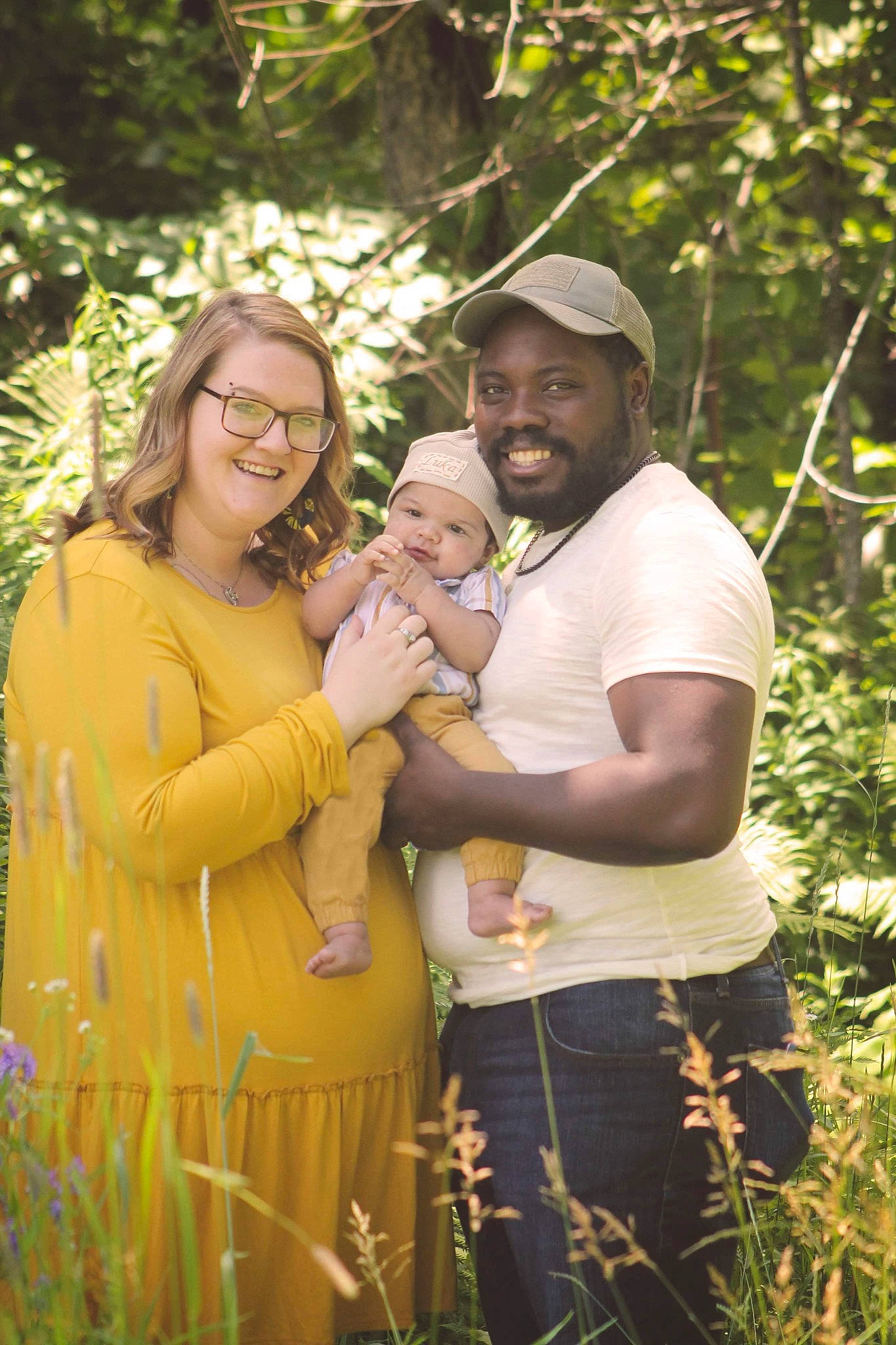 Luka is registered to the contest to win money with this photo: abdomen, adaptation, baby, event, fun, glasses, grass, grassland, happy, hat, headwear, joy, leisure, people_in_nature, person, plant, prairie, shirt, shorts, smile